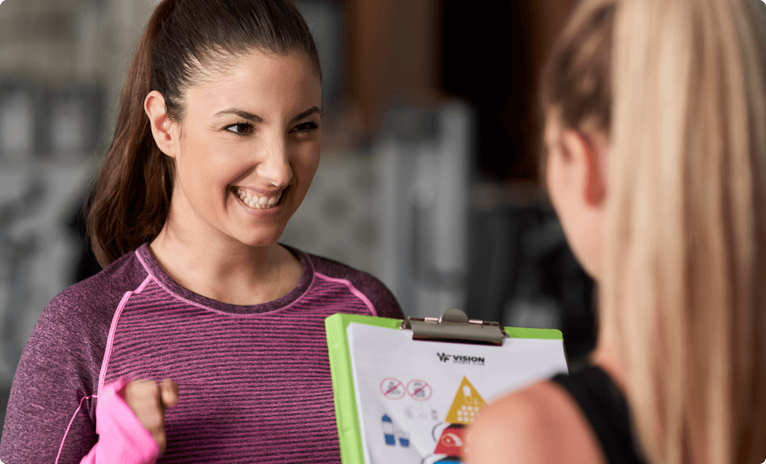 Woman excited to see the meal plan her fitness Nutrition Specialist has designed for her.