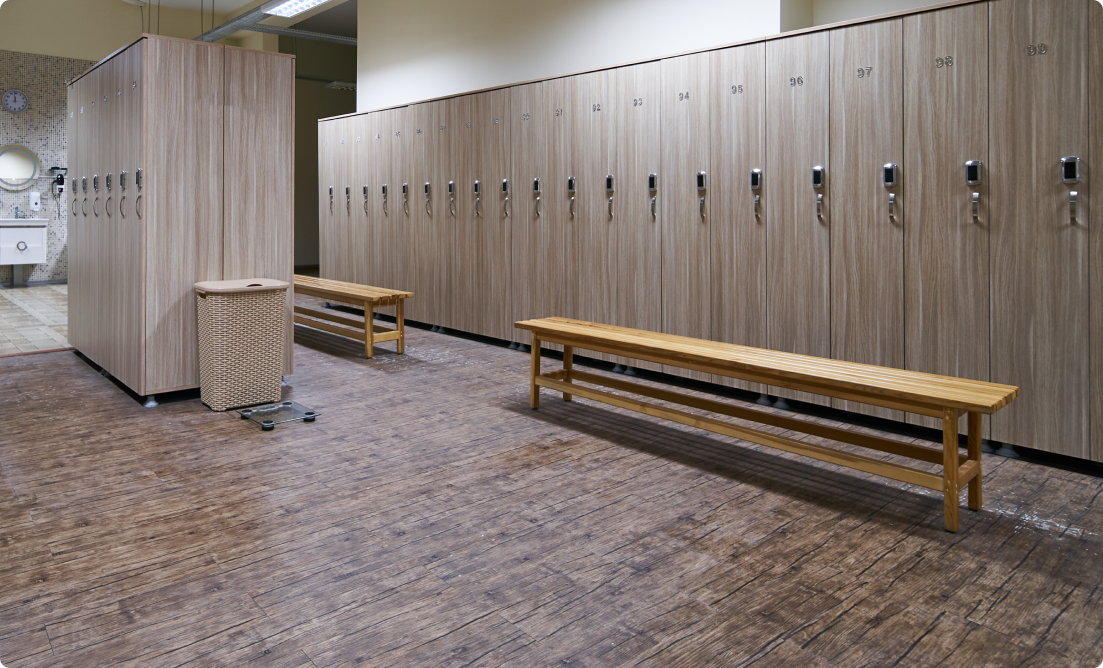 View of a big and clean gym changing room with lockers