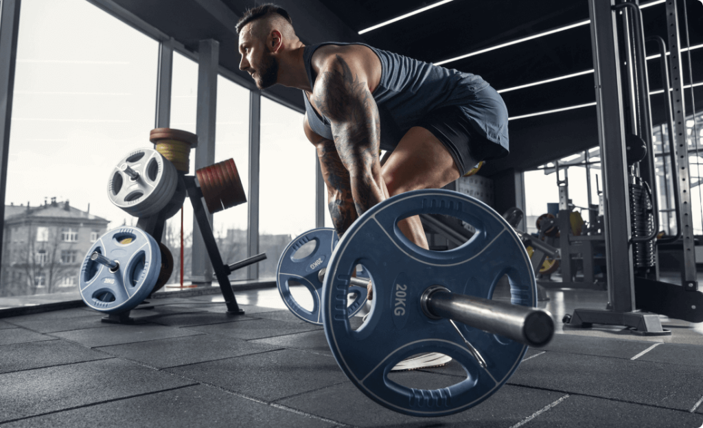 A bodybuilder in proper form during lifting weights