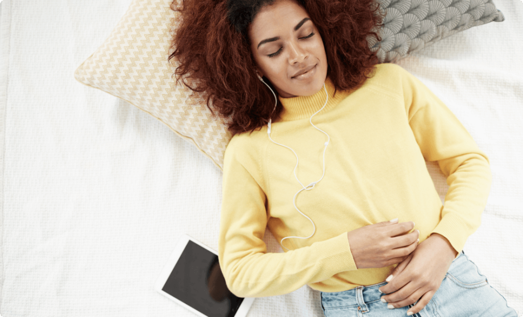 A girl lying on bed and having rest