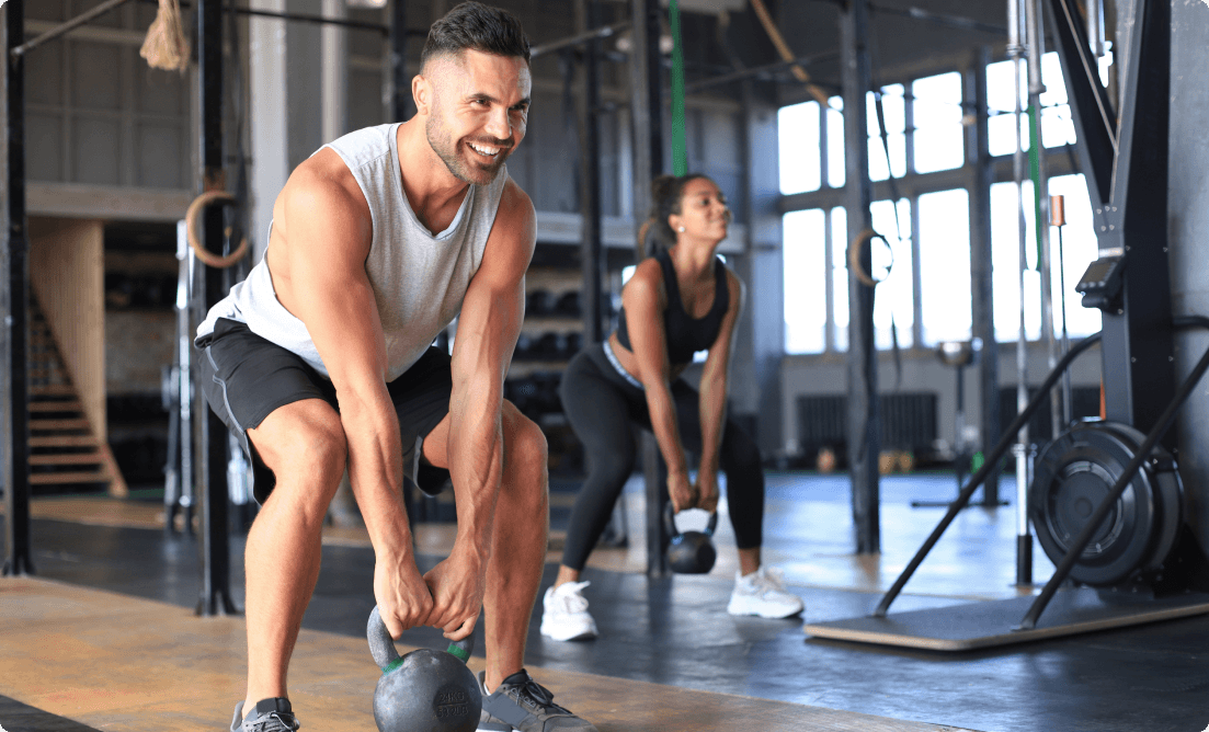 Couple working out in a gym